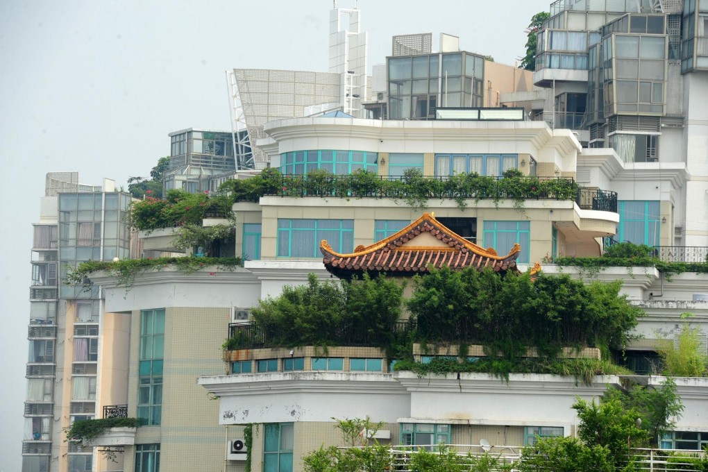 A temple on the roof of a 21-storey building in Shenzhen. Photo: AFP