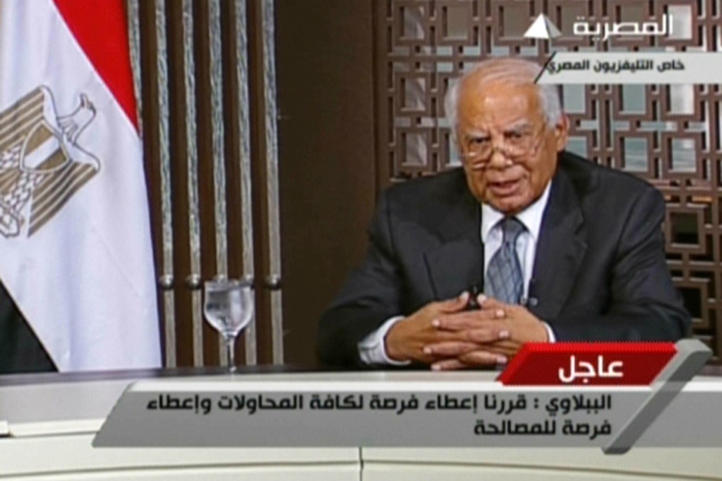 Screen grab from Egyptian state television shows Egypt's interim prime minister Hazem al-Beblawi. Photo: AFP