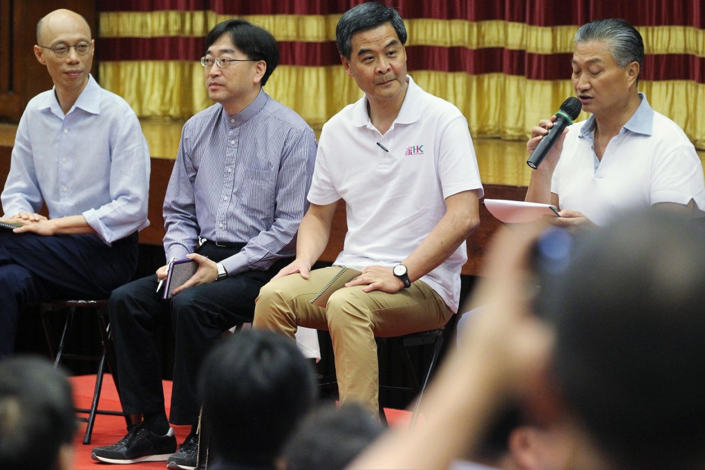 The chief executive sports the new logo. Photo: K.Y. Cheng