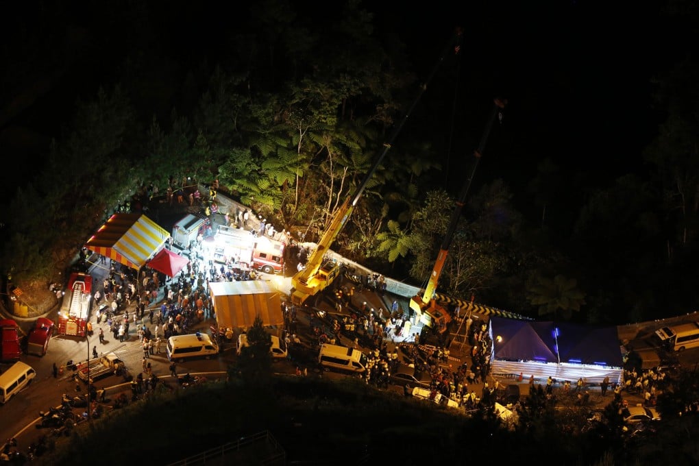 Rescue operation after the bus crash in Genting Highlands. Photo: Reuters