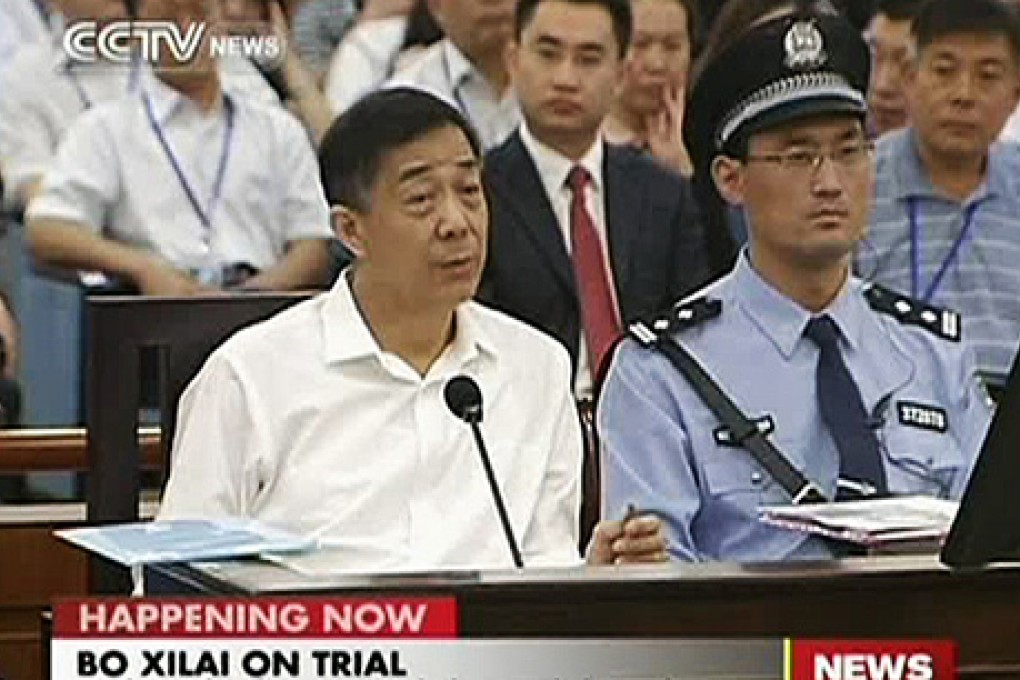 Bo Xilai speaks during a court hearing in Jinan, Shandong province, on Thursday in this video image. Bo appeared in public for the first time in more than a year to face China's most political trial in over three decades. Photo: Reuters