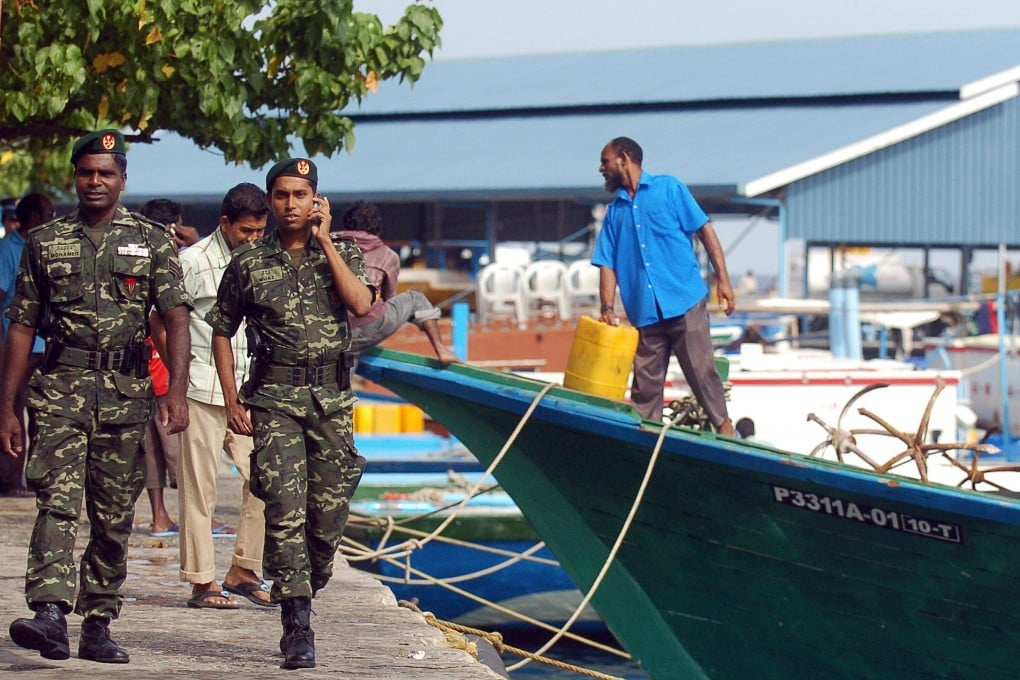 Maldivian security forces at the waterfront in Male. Photo: AFP