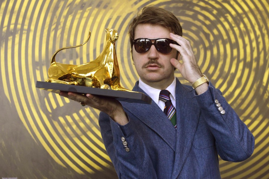 Albert Serra with his Golden Leopard for The Story of My Death. Photo: AP