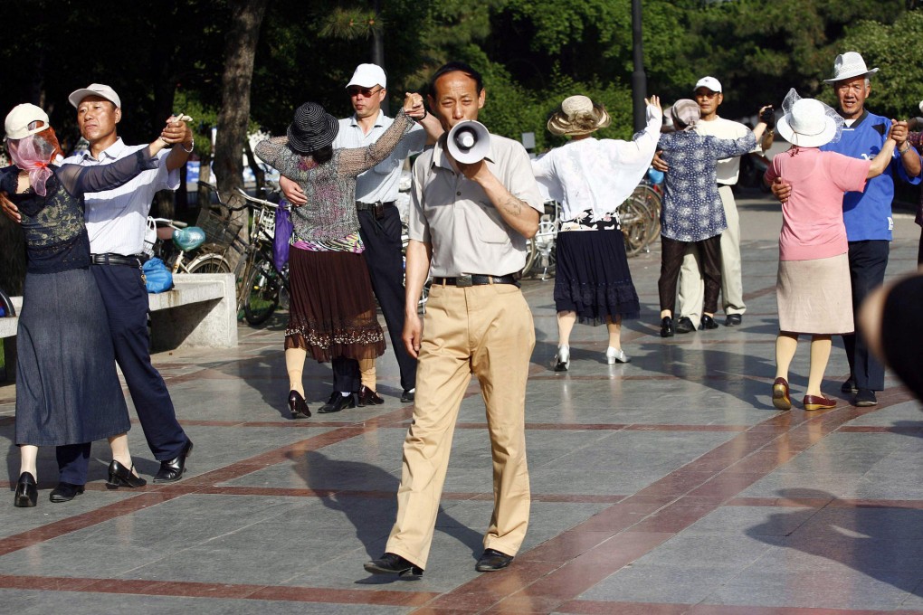 Elderly Chinese couples relax at a park in Shenyang. The mainland's ageing population is a thriving market for US direct selling firms of vitamins and beauty products. Photo: AFP