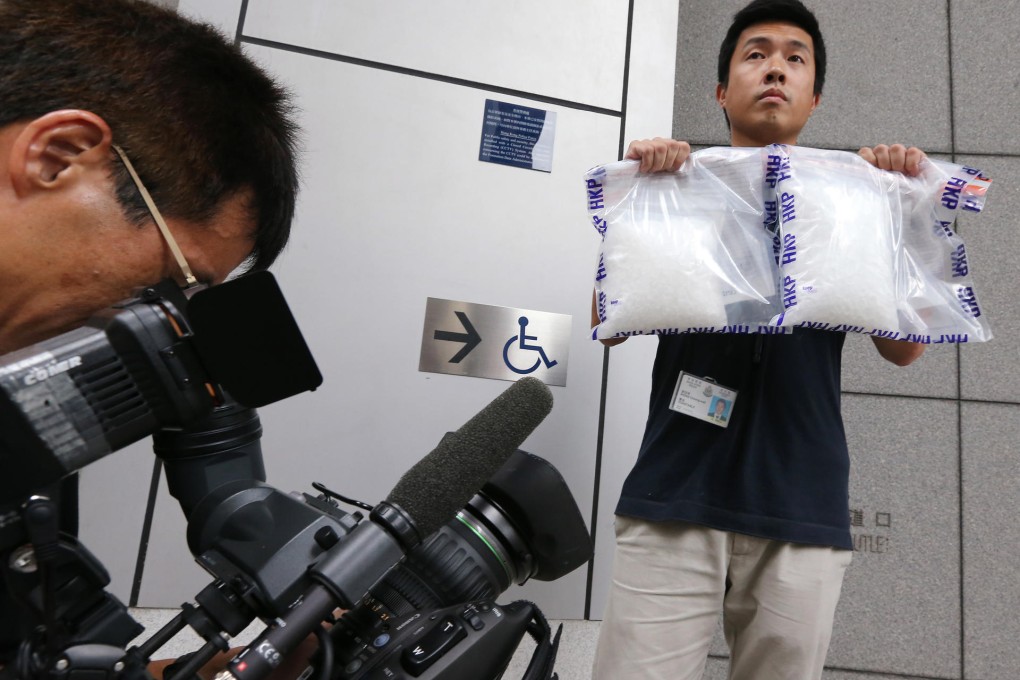 Police officer Wong Cheong-wah displays drugs. Photo: Felix Wong