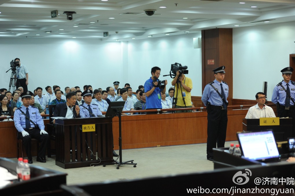 Bo Xilai and Wang Lijun at the Jinan Intermediate Court on Saturday.