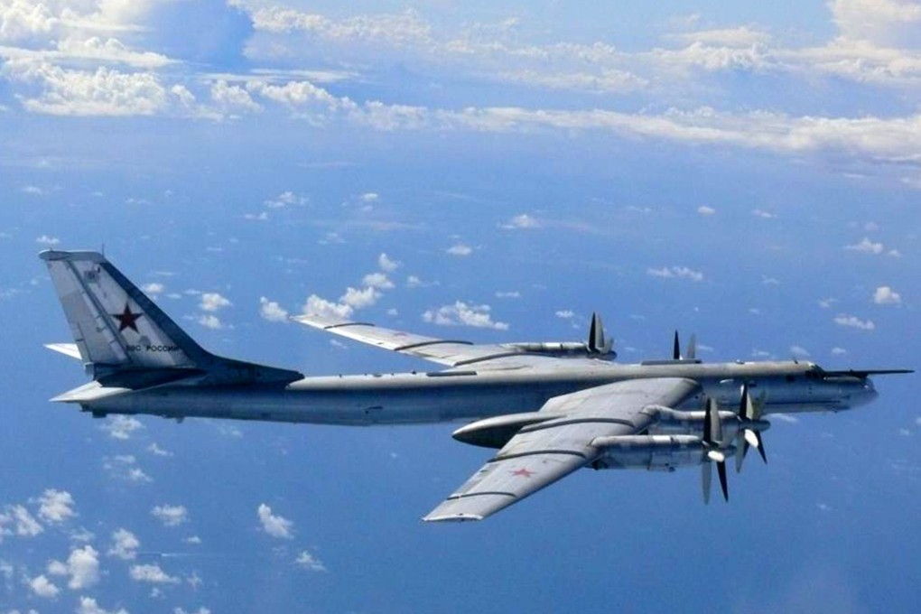 A Russian bomber TU-95 flying in airspace near the isle of Okinoshima in western Japan. Photo: AFP