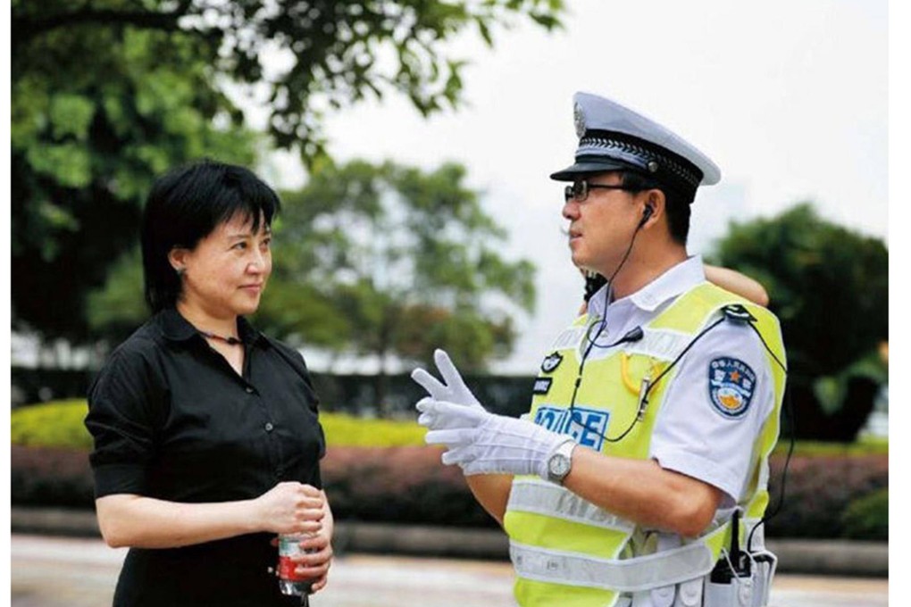 Bo's wife Gu Kailai with his former right-hand man Wang Lijun, in uniform - the pair became very close, according to Bo. Photo: SCMP