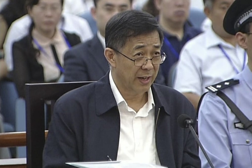 Bo Xilai speaks in a court room at Jinan Intermediate People's Court in Jinan. Photo: AP