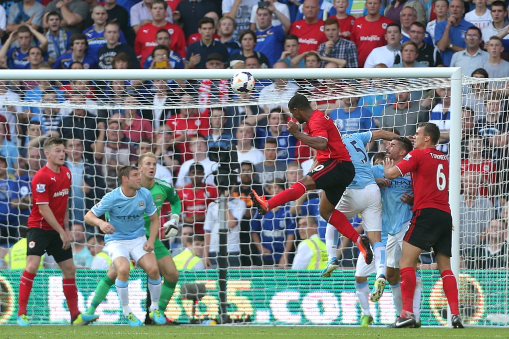 Cardiff City's Fraizer Campbell scores his side's third goal of the game during their English Premier League match against Manchester City at Cardiff City Stadium on Sunday. Photo: AP