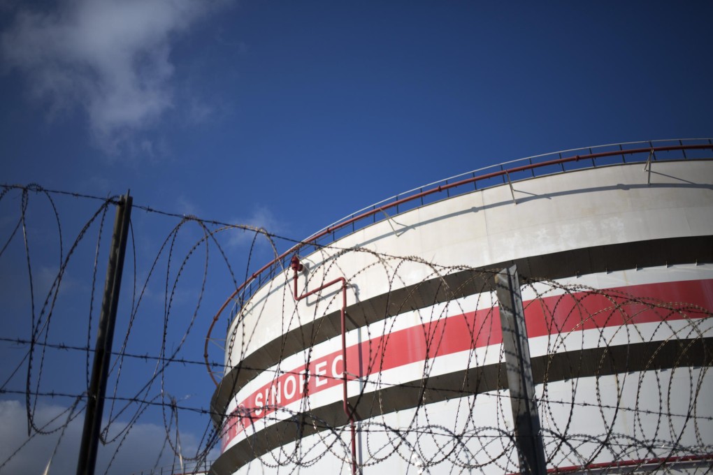 Sinopec's oil refining business will "markedly" improve in the second half, chairman Fu Chengyu says, after a revamp of the fuel pricing system is reflected. Photo: Bloomberg