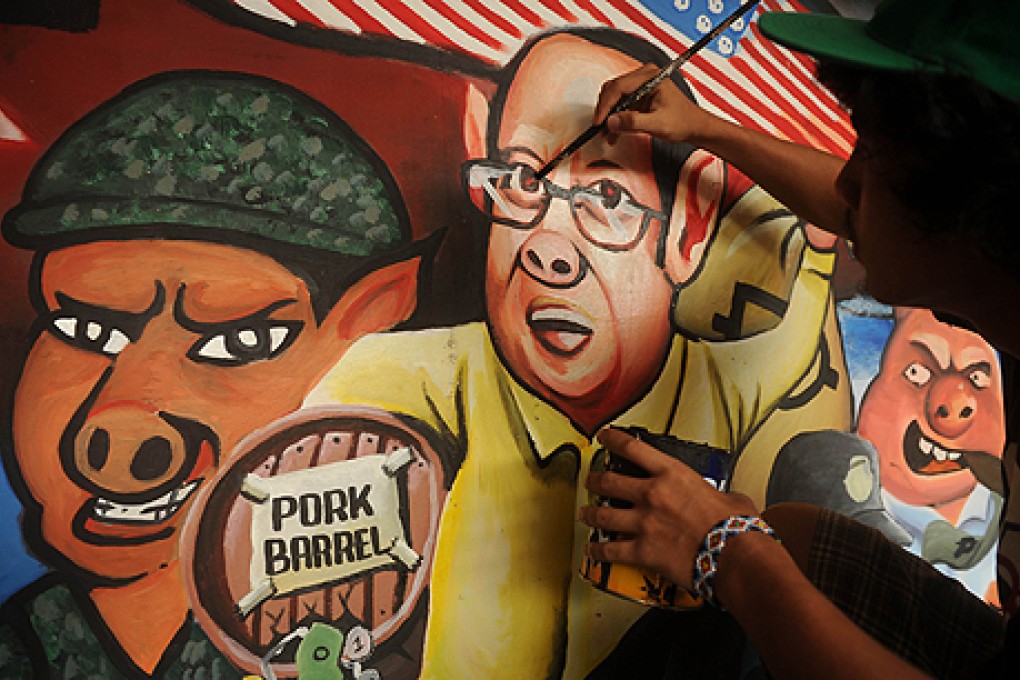 Protesters’ artwork featuring Philippine President Benigno Aquino that was used in a mass protest against corruption in Manila on Monday. Photo: AFP
