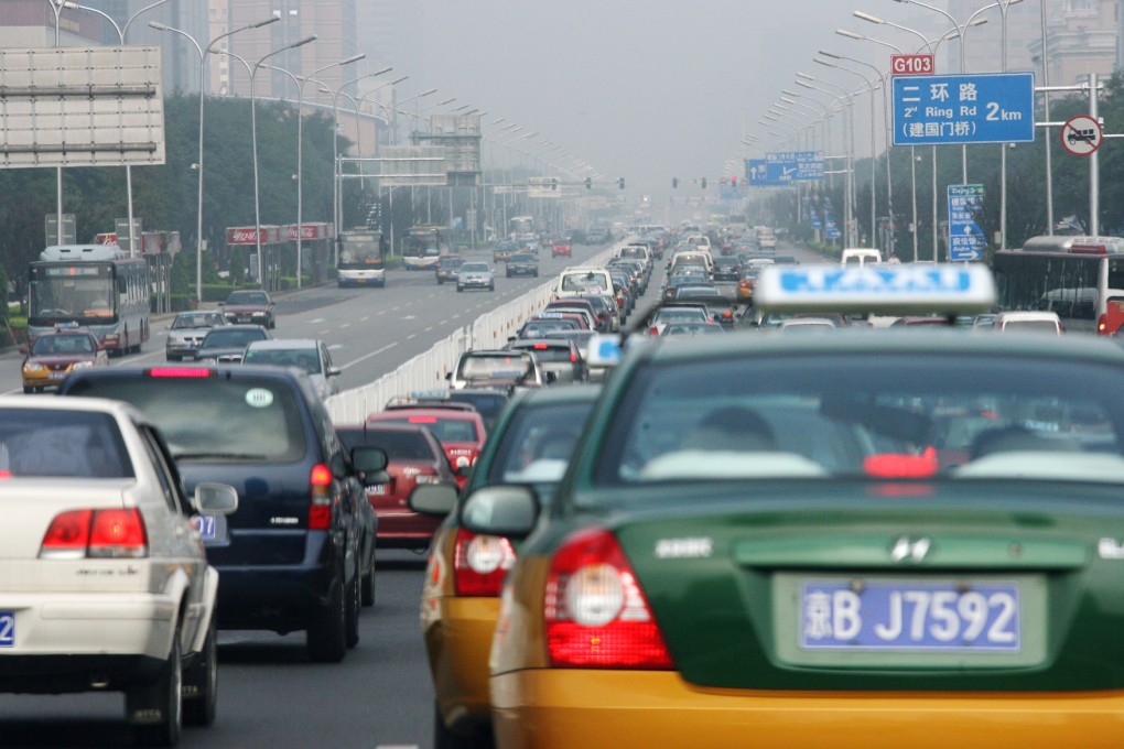 Taxis line up in the midst of a heavy Beijing traffic jam. Photo: Felix Wong