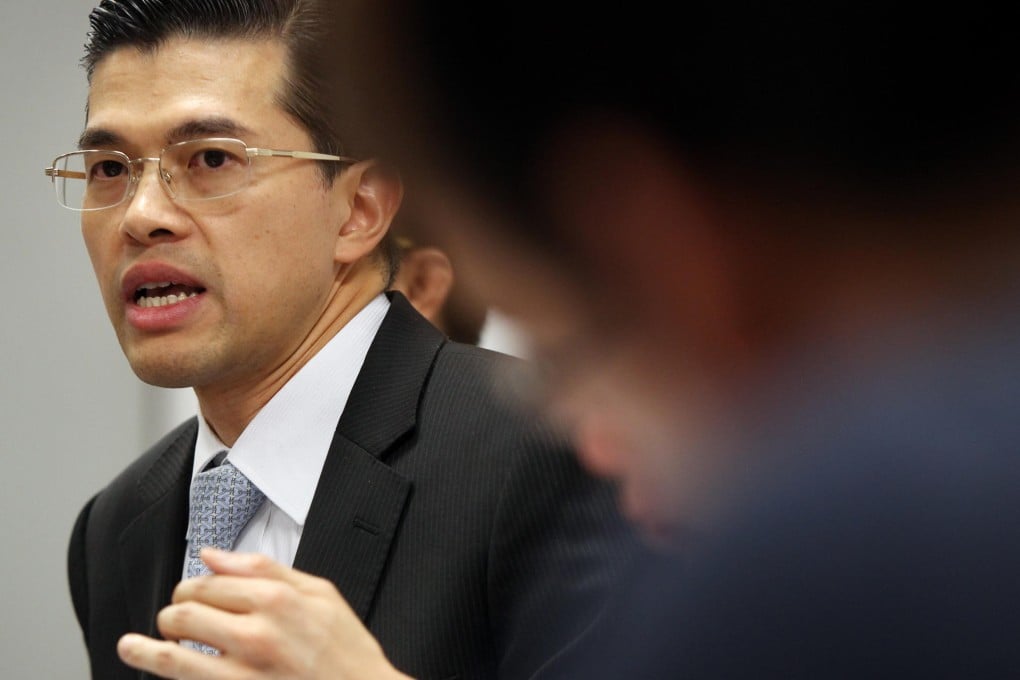 Yu Cheuk-man at his media conference yesterday where he produced certificates showing his competence in two procedures. Photo: Sam Tsang