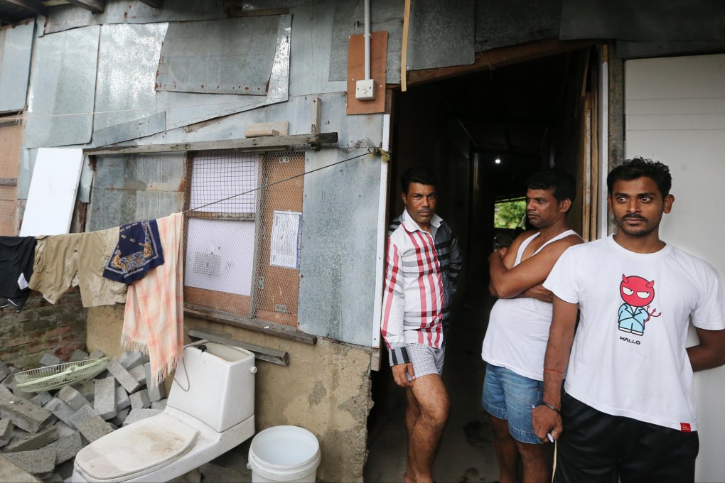 Three men at the humble home