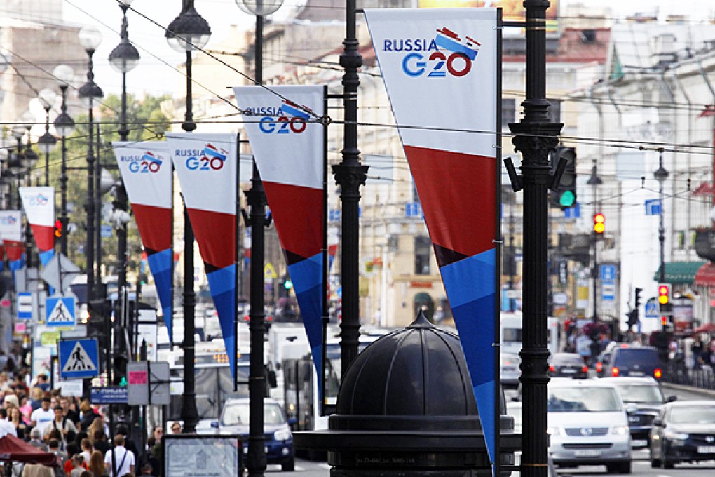 Banners for the G20 Summit hang in in central St Petersburg. Photo: Reuters