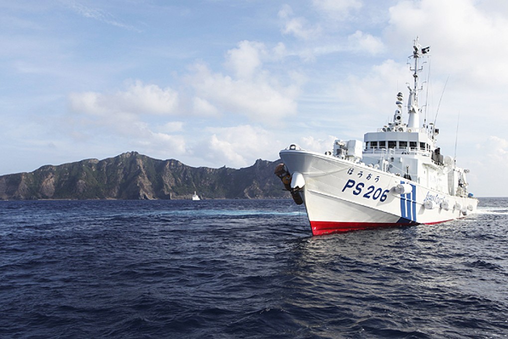 A Japan Coast Guard vessel patrols off the disputed Diaoyu Islands in the East China Sea. Photo: Reuters