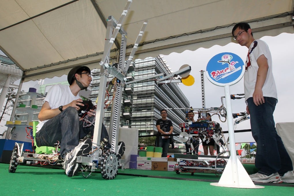 Students from Hong Kong University of Science and Technology display their robots in Inno Carnival at Science Park Sha Tin. Photo: SCMP