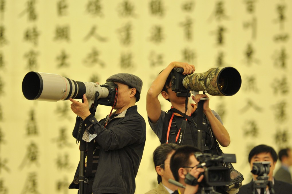 Journalists at work during a press conference after the National People's Congress in 2011. Photo: Xinhua