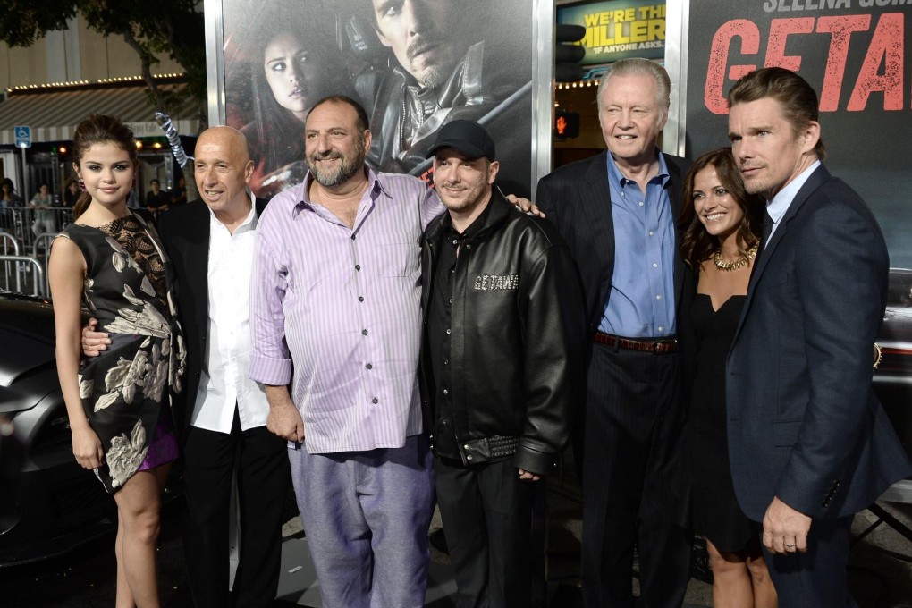 Allan Zeman (second left) with the cast and crew. Photo: AFP