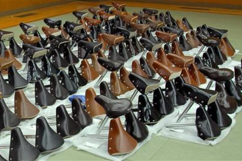 Part of the massive collection of bicycle seats stolen by Joji Kondo. Photo: Screenshot via Sankei Shimbun