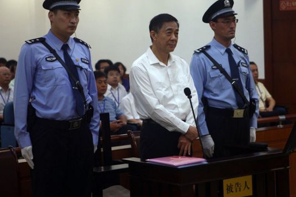 Disgraced Chinese politician Bo Xilai stands trial inside the court in Jinan, Shandong province last week. Photo: Reuters