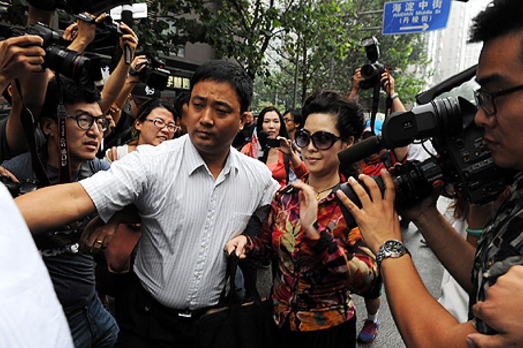 Li Tianyi's mother, Meng Ge, arrives at court in Beijing on Wednesday. Photo: Xinhua