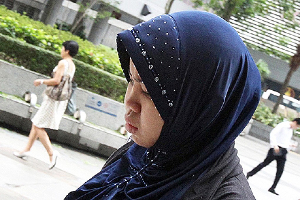Kartika Puspitasari, whose employers allegedly beat her, also claimed in court on Tuesday that she was not paid for her work. Photo: David Wong