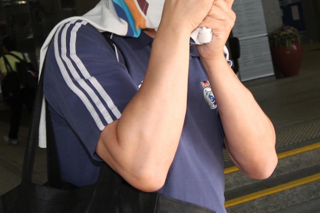 Employer Tai Chi-wai leaves the District Court. Photo: David Wong