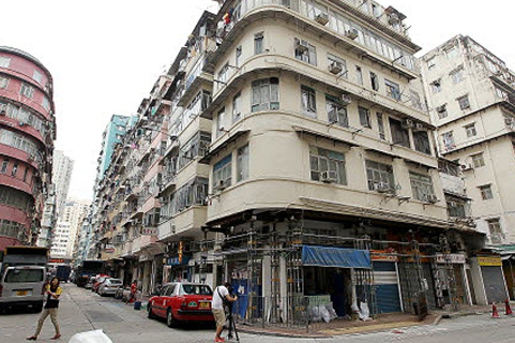 The ageing block on 51 Kai Ming Street has structurally unsafe enclosed balconies and residents have been ordered to vacate the building. Photo:  Edmund So