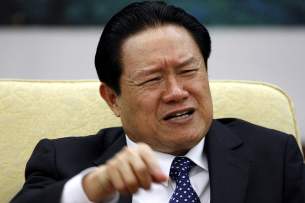 Zhou Yongkang gestures as he attends a discussion session of the 17th National Congress in Beijing in 2007. Photo: Reuters