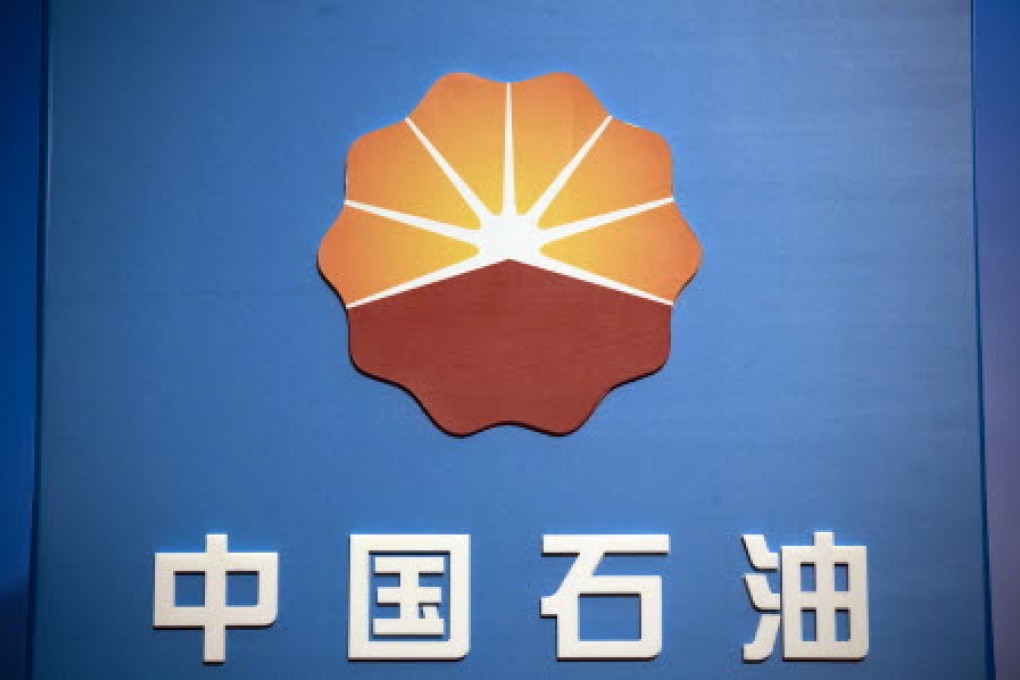 Shares of PetroChina fell after the firm's three top managers were under investigation for alleged violations of discipline. Photo: Bloomberg