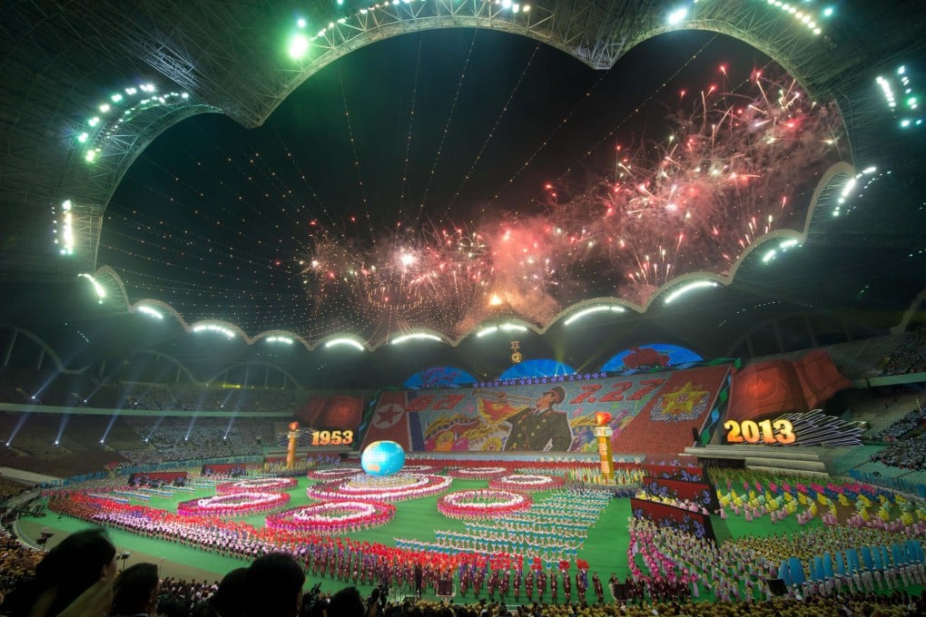 The 150,000-seat Rungnado May Day Stadium in Pyongyang is filled with hundreds of thousands of performers and spectators for the Arirang Festival mass games (left). The Taedong Diplomatic nightclub (above) and its casino (far right). A customer sings in the Egypt Palace Karaoke in the Yanggakdo hotel's basement (above right) while members of the tour group pose in uniforms made by the hotel's tailor (below right). The Taedonggang Craft Brewery Bar (right). The bowling alley bar in the Yanggakdo (below). A flyer promoting a gig by Brian Offenther, aka DJ BO, the first western DJ to play in Pyongyang.Photos: AFP, Joseph Ferris, SMP Pictures