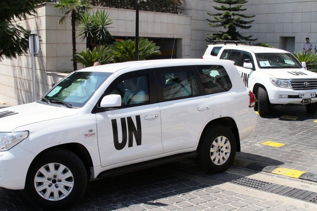 UN inspectors on the way to probe the attack. Photo: AFP