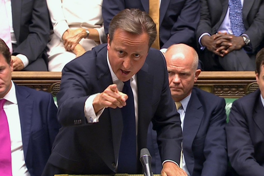 David Cameron goes on the attack in Parliament during the debate on Syria - but the result of the vote was a hammer blow for the British prime minister.Photo: Reuters