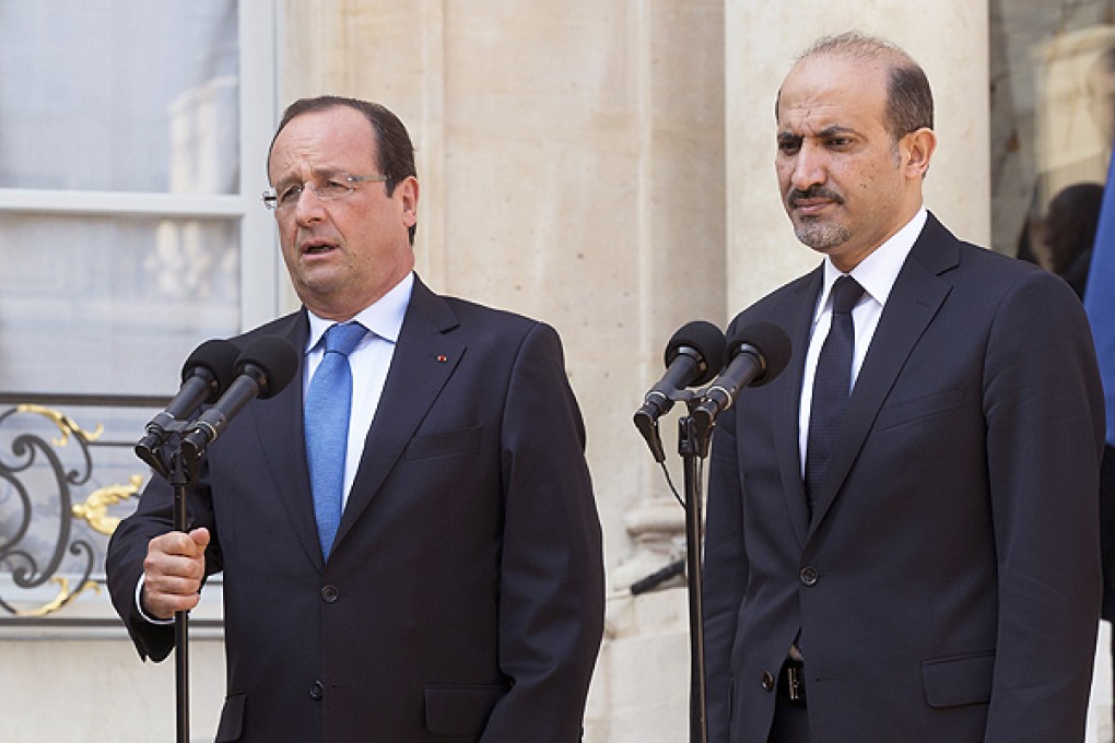 French President Francois Hollande and head of the Syrian National Coalition, Ahmad al-Jarba, meet at the Elysee Palace. Photo: AP