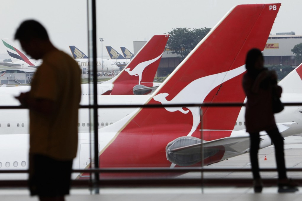 Australia's flagship carrier formed an alliance with Emirates Airline this year in an effort to trim losses on international routes. Photo: Reuters
