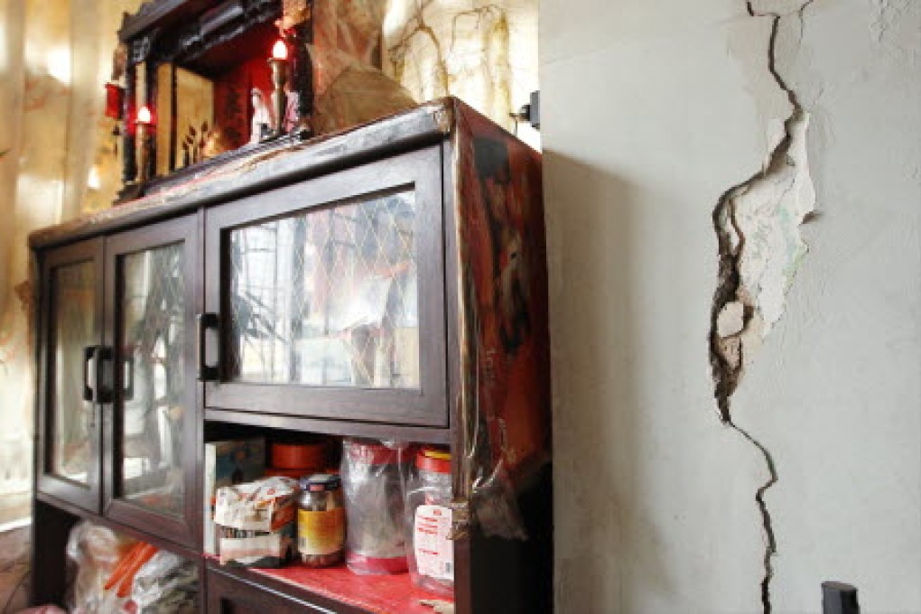 A flat in the To Kwa Wan tenement cries out for repairs, but residents must move out for inspectors to run further checks. Photo: Edmond So
