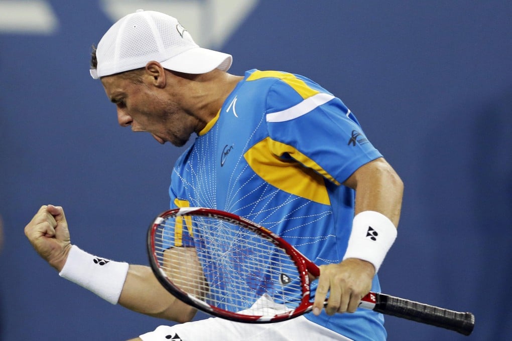 Australia's Lleyton Hewitt is pumped up after winning a point against Juan Martin Del Potro at Flushing Meadows. Photo: AP