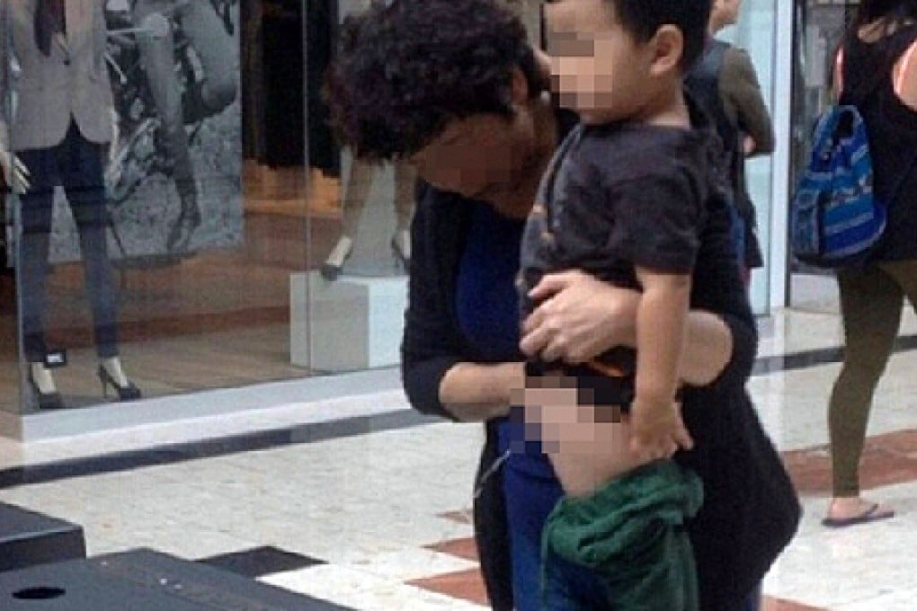 An image of the boy and a woman at a Canadian shopping mall. Photo: Brandon Beavis/Twitter