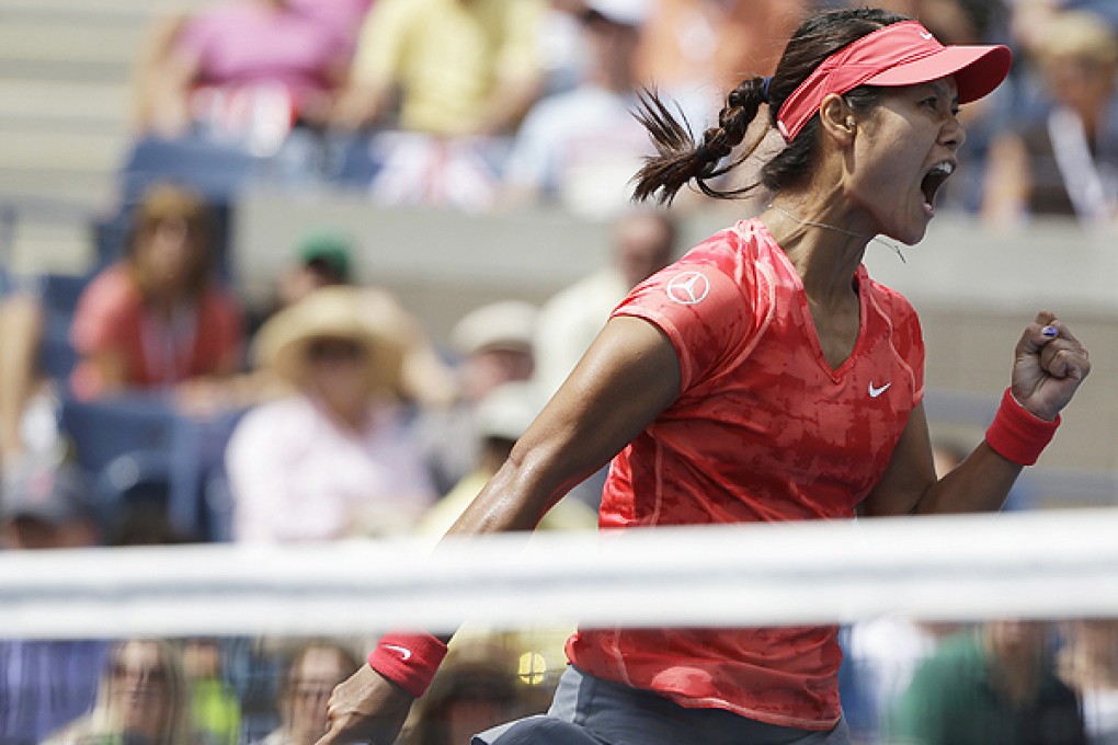 Li Na celebrates a point over Laura Robson during their third-round tie at the US Open in New York. Photo: Reuters