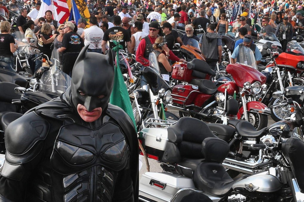 Even Batman was among hog enthusiasts from all over the world who swapped tales before joining a parade. Photo: AFP