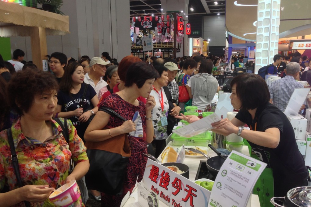 Customers sample food at the Expo on August 30, 2013. Photo: Anna Fenton