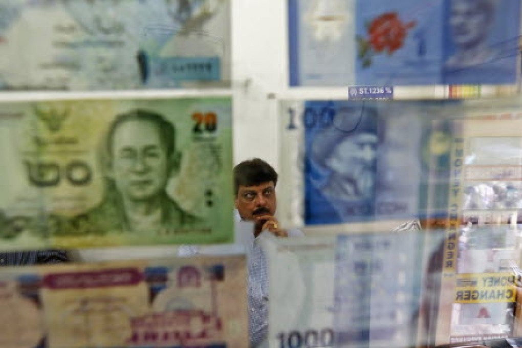 Currencies in some developing nations are plunging to alarming levels against the US dollar. Photo: Reuters