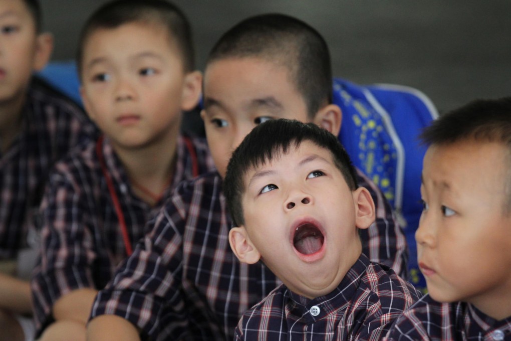 Tired children arrive at Lam Tsuen Public Wong Fook Luen Memorial School in Tai Po. Photo: Dickson Lee