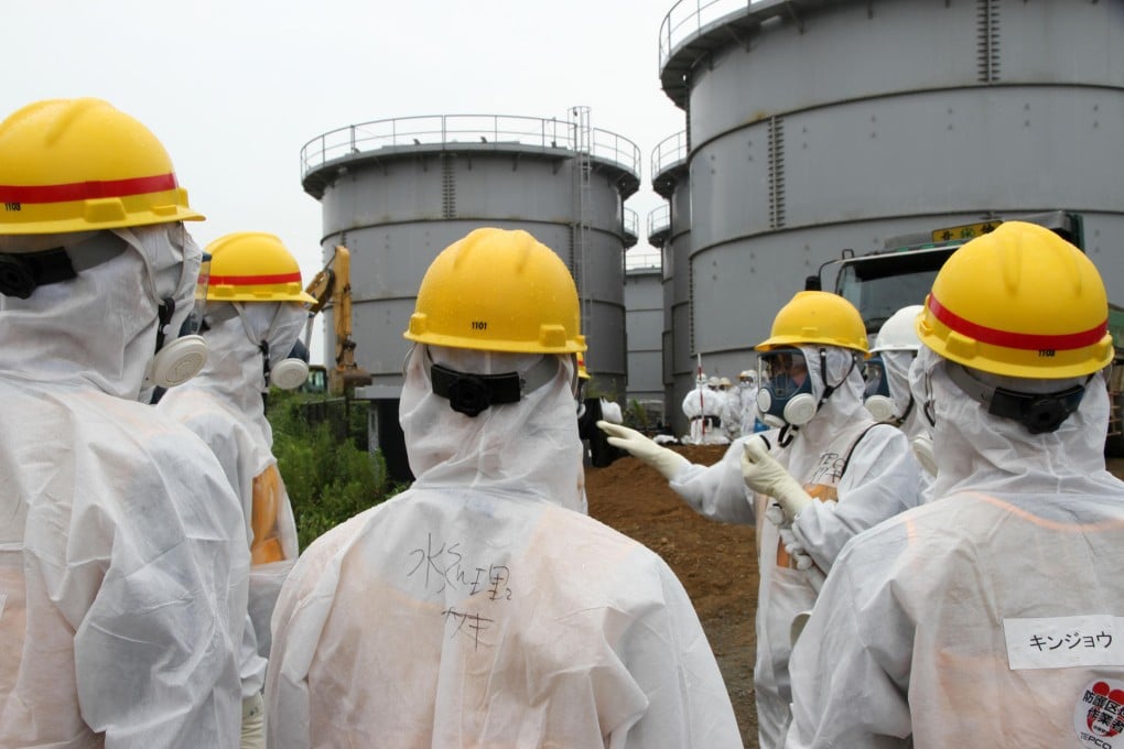 Japanese nuclear inspectors visit the plant. Photo: Bloomberg