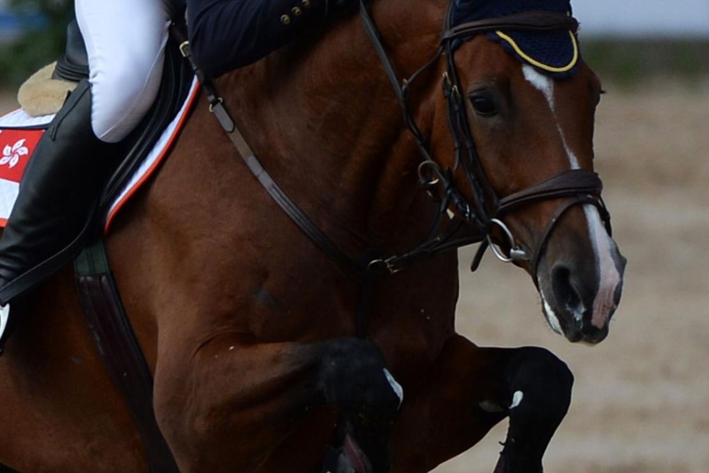 Patrick Lam and Come Zaak complete a jump. Photo: AFP