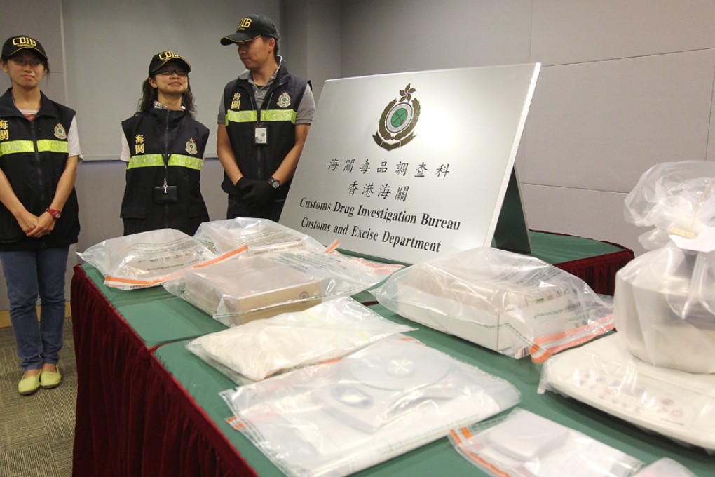 Customs and Excise Department seized 4.7 kilograms of cocaine at a crack cocaine manufacturing centre in Tai Kok Tsui. Photo: SCMP