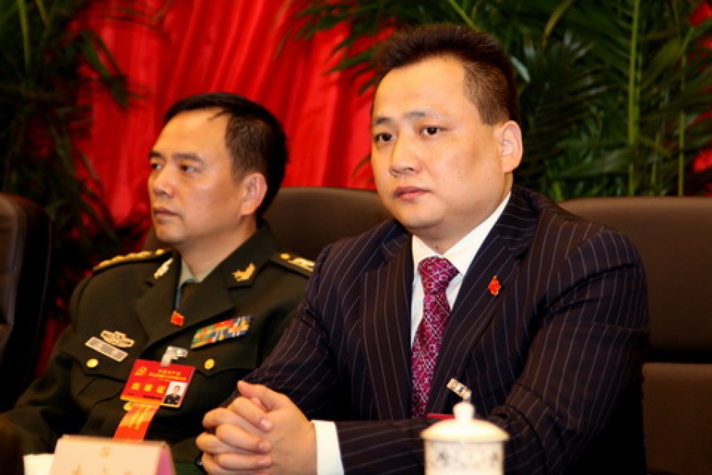 Li Guangyuan, chairman of Sichuan Star Cable Corp., seen at a Leshan party meeting last year. Photo: SCMP Pictures