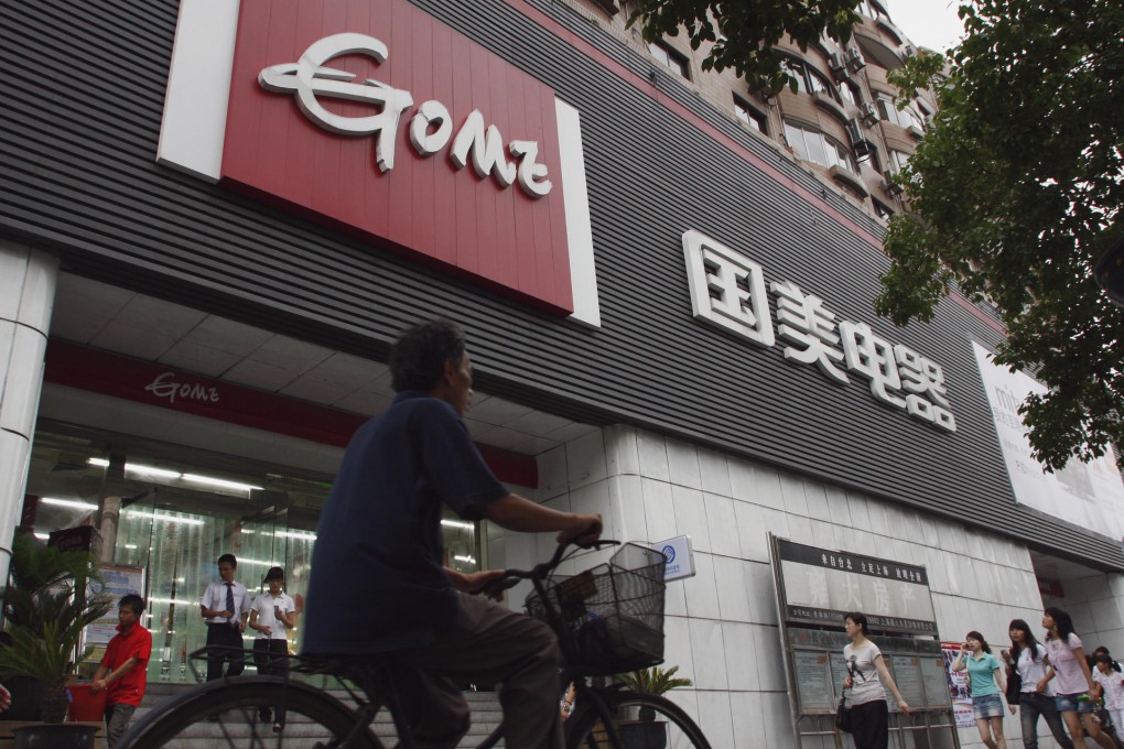 A Gome store in Shanghai. The firm has cut floor space as online competition grows. Photo: Bloomberg